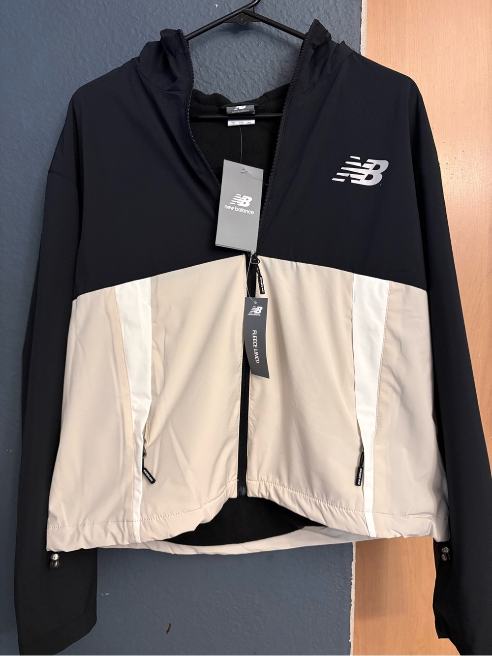 New Balance Women’s Black and Cream Hooded Colorblock Jacket